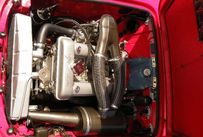 Trimoba AG / Oldtimer und Immobilien,Dieser Alfa Romeo ist ein Mischling: Von der Karosserie her eine Giulietta Spider Jg.1960, seitens des Motors, 1600 Veloce (Typ 10123) eine Giulia Spider, hergestellt 1964-65 mit 112 PS, 4 Zyl. Vielleicht hat der Besitzer mal den Motor gewechselt.
