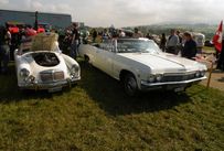 Trimoba AG / Oldtimer und Immobilien,li-re: MG A: 4 Zyl. 1600ccm Jg.55-62 / Chevrolet Impala 1965